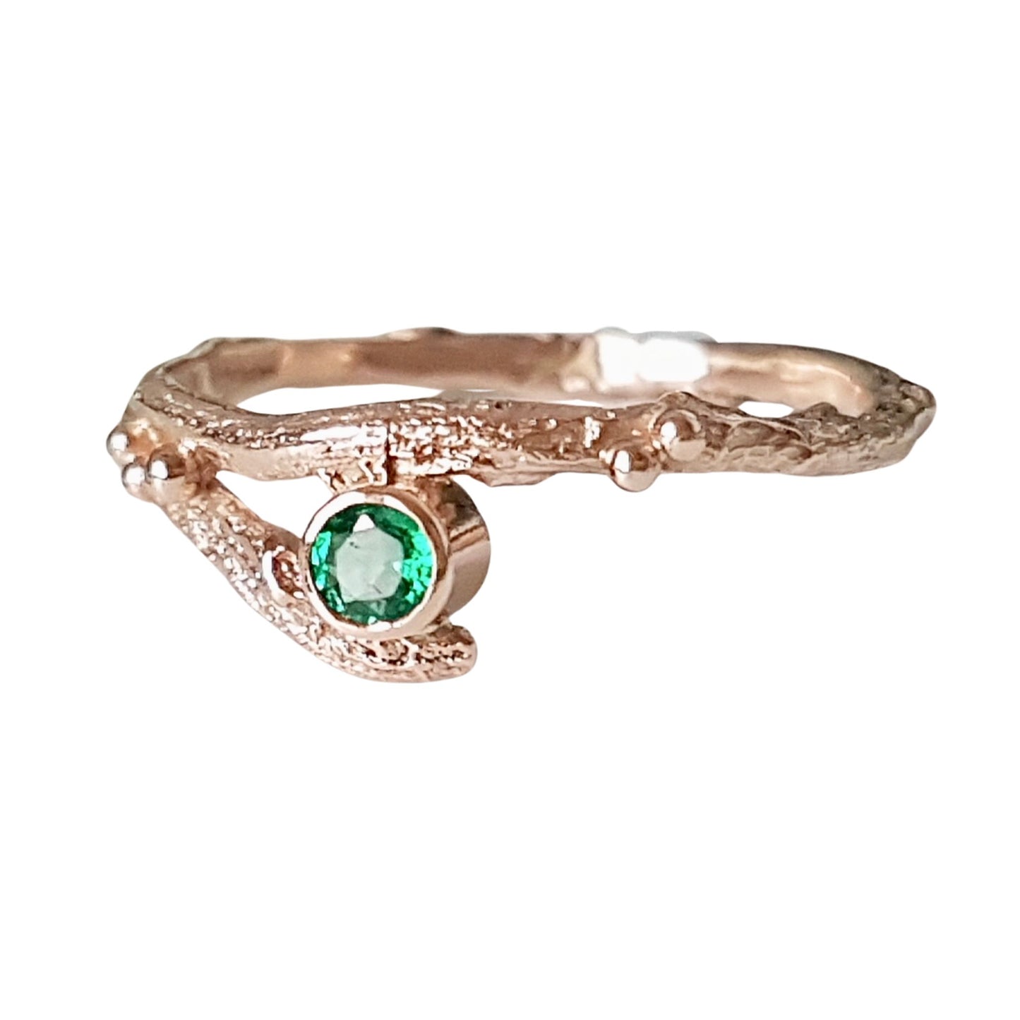 Rose Gold nature inspired twig engagement and wedding ring set. Cast from a real twig in 9ct red gold and set with a natural Emerald.