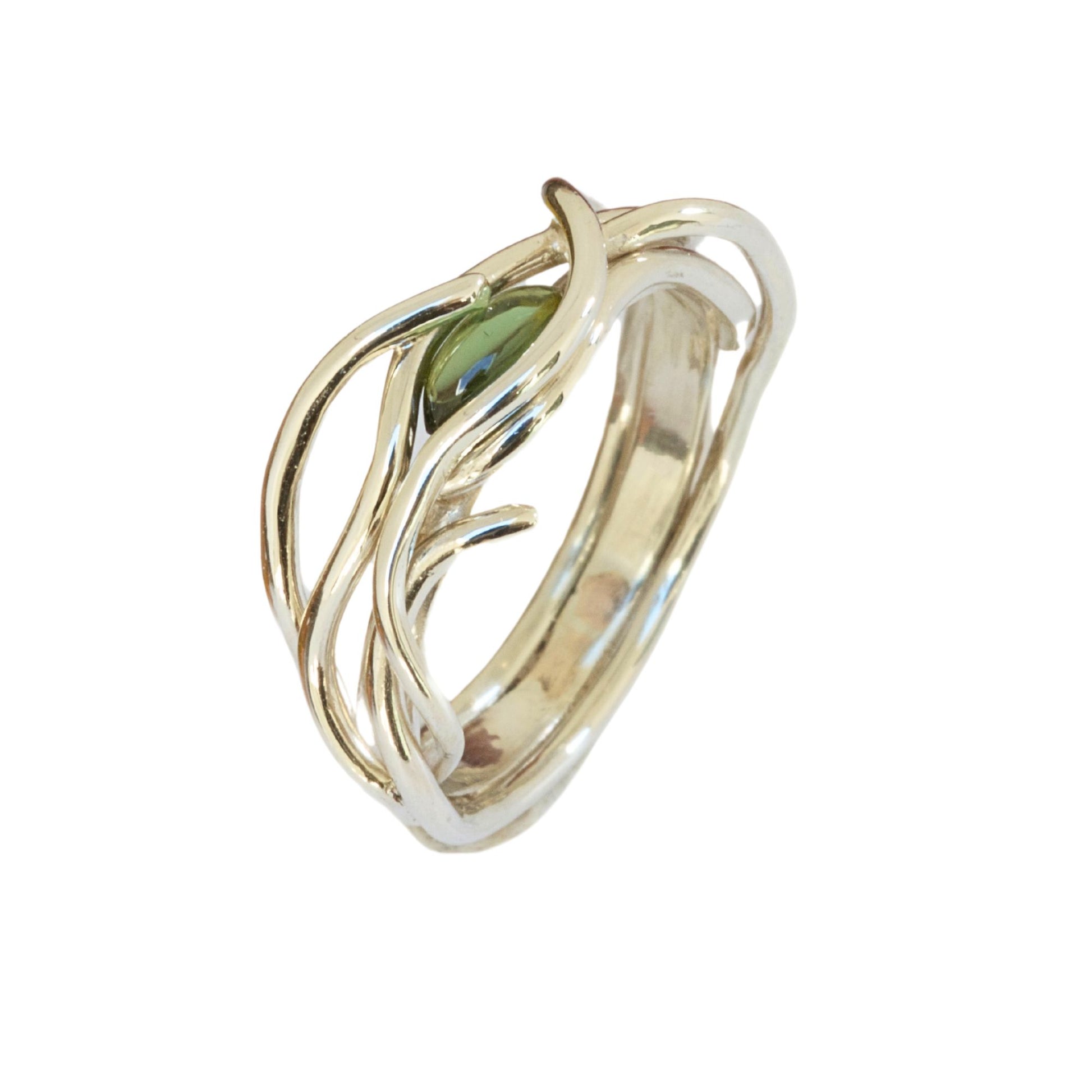 Unique entwined white gold infinity ring set with a marquise natural gemstone.