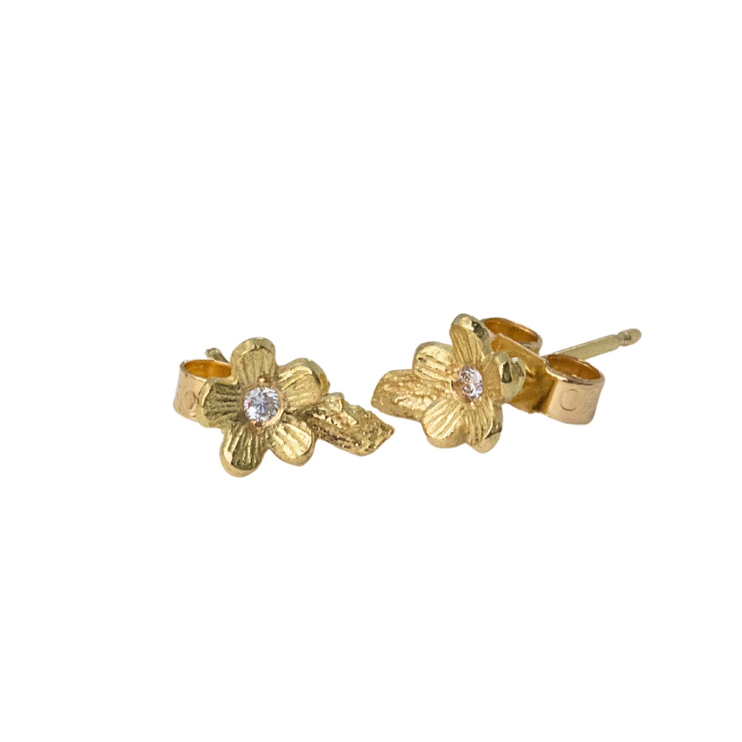 nature earrings, small flower studs set with natural diamonds.