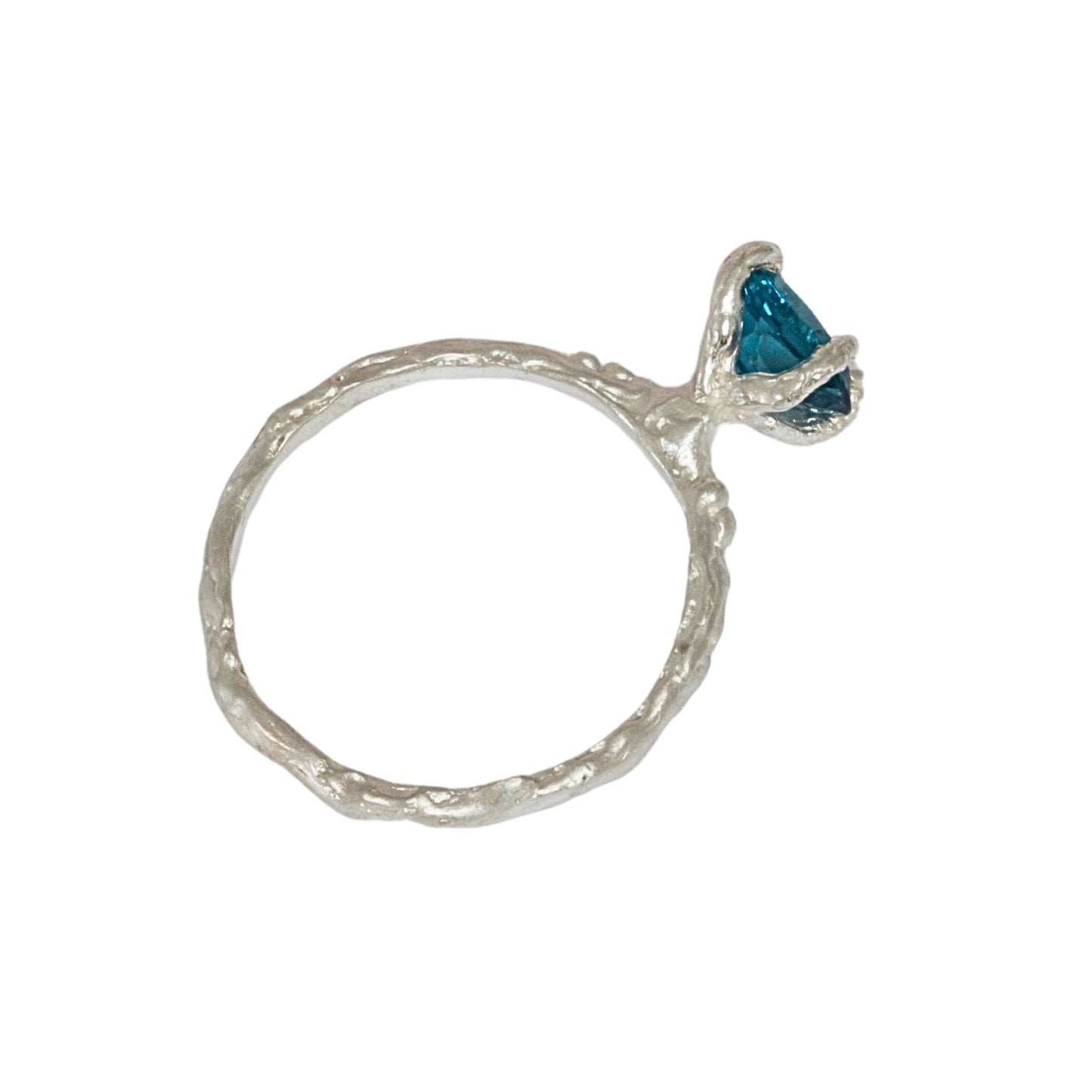 Caroline Brook Jewellery Silver Organic Earth Ring four claw textured ring set with a London Blue Topaz.