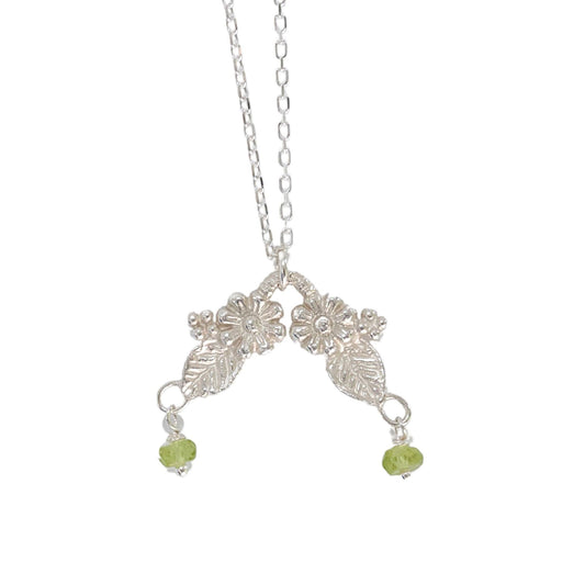 Silver botanical peridot necklace