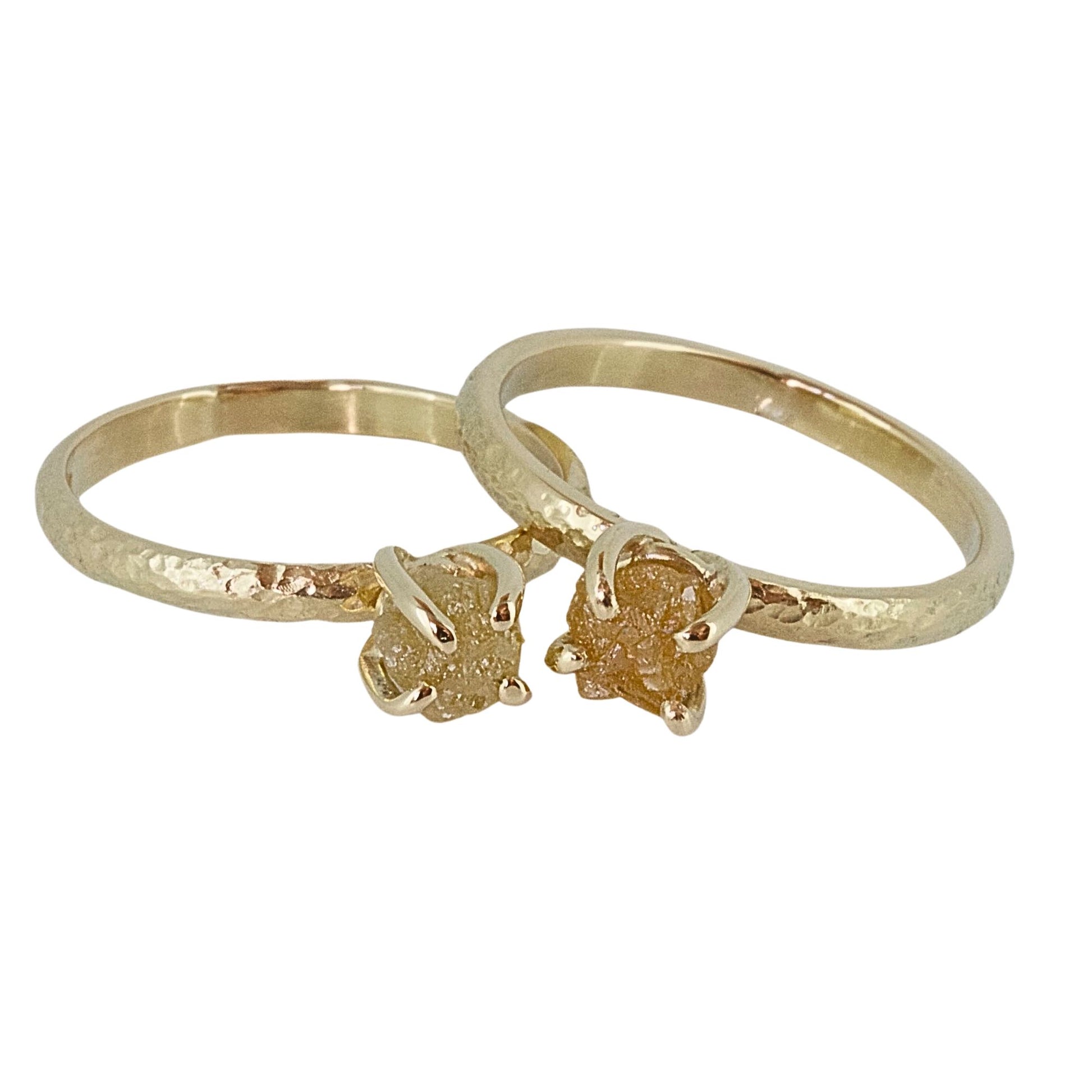 textured 18ct gold engagement ring with a claw set natural rough uncut diamond.