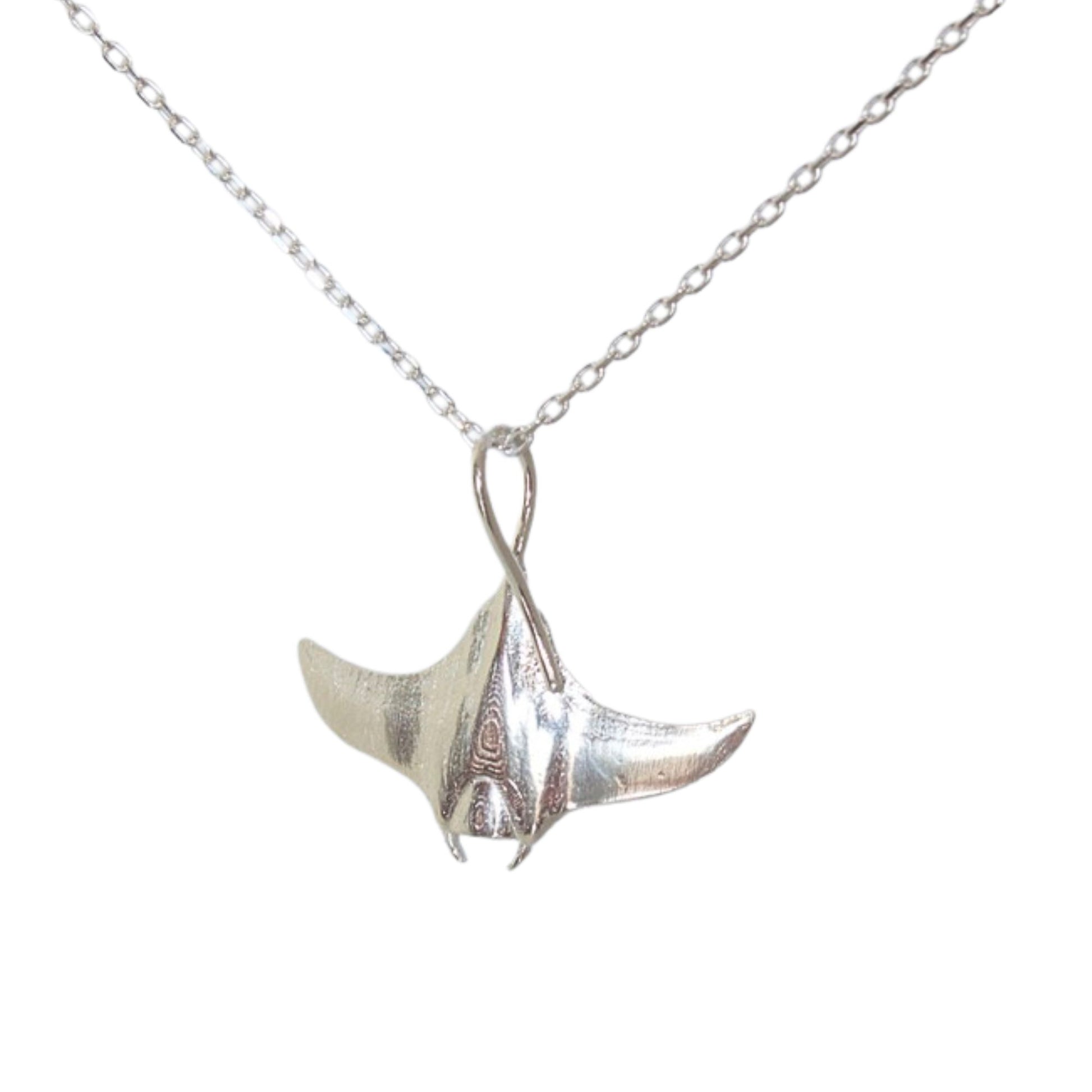 solid sterling silver manta ray pendant on a diamond cut trace chain.